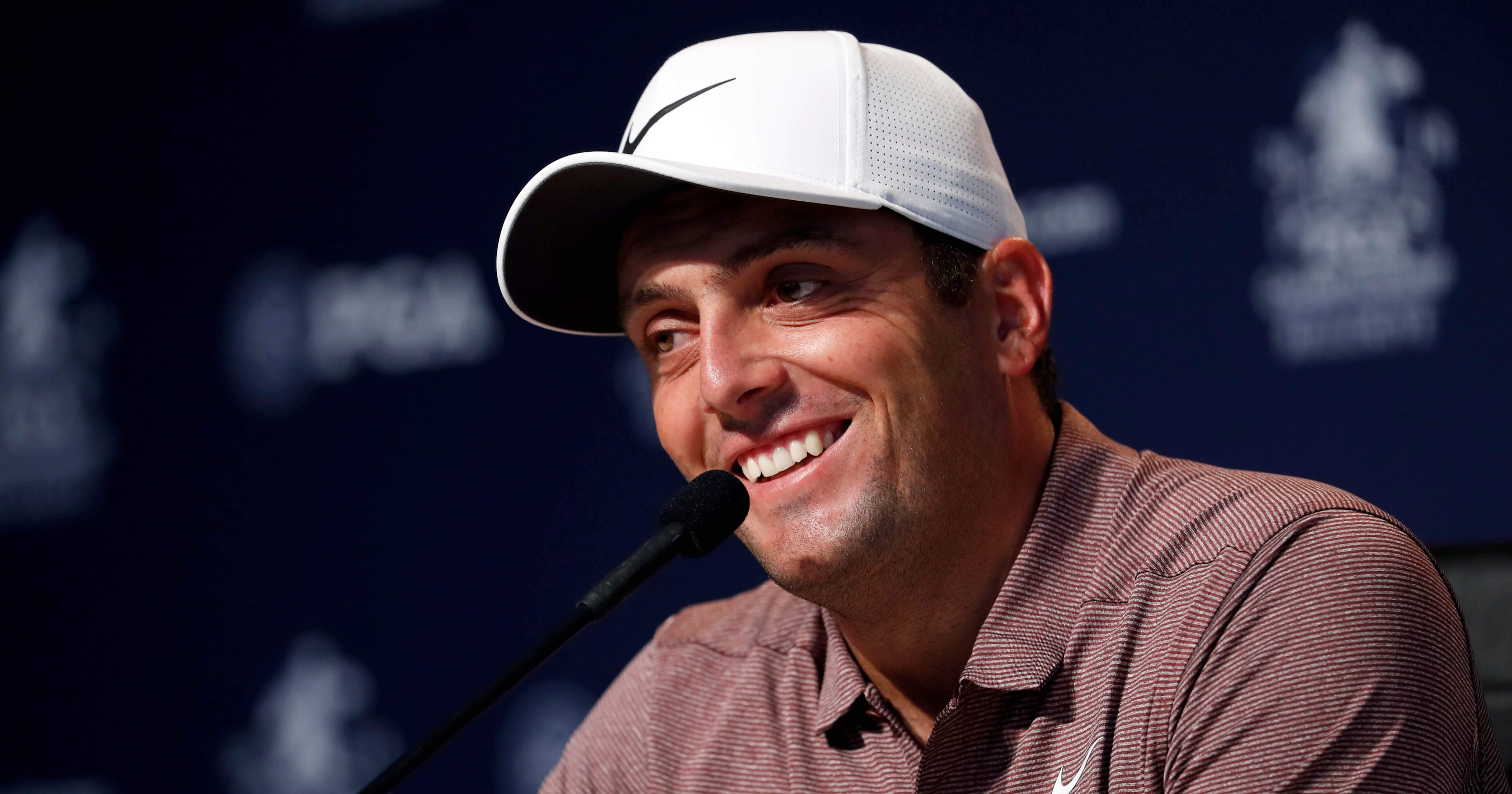 Francesco Molinari, of Italy, smiles as he listens to a question during a news conference at the PGA Championship golf tournament Tuesday, Aug. 7, 2018, at Bellerive Country Club in St. Louis.