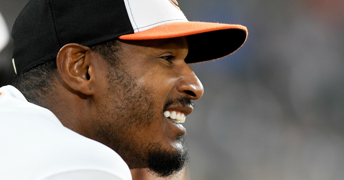 Adam Jones #10 of the Baltimore Orioles watches the game against the Kansas City Royals at Oriole Park at Camden Yards on May 8, 2018 in Baltimore.