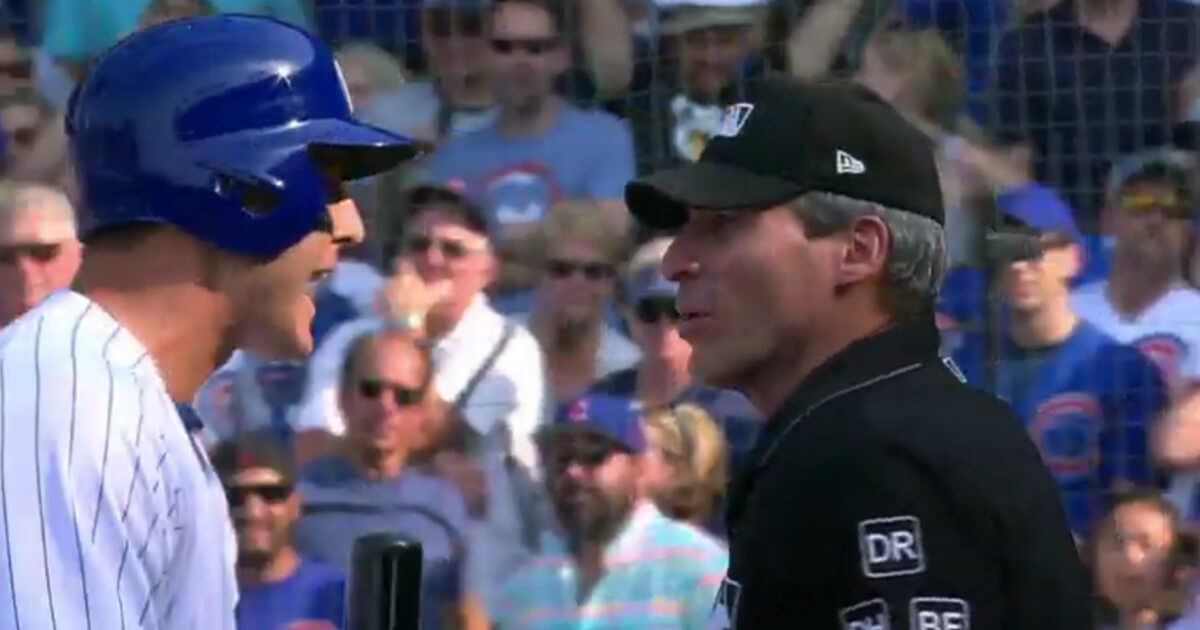 Cubs first baseman Anthony RIzzo argues with umpire Angel Hernandez following a game-ending thrid-strike call.
