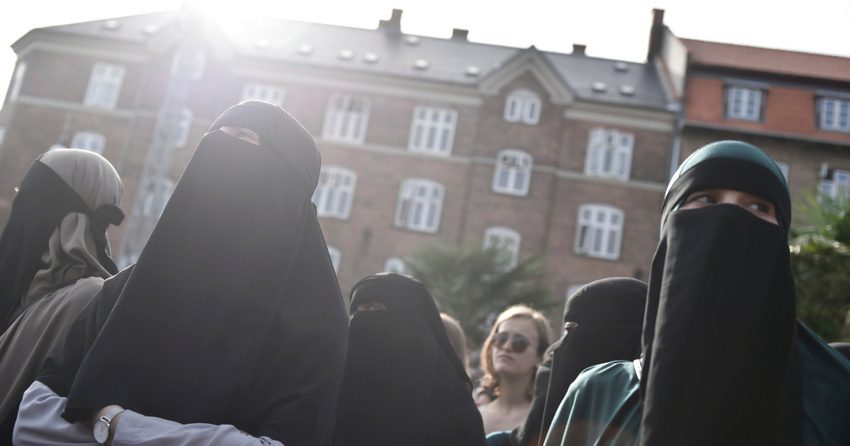 Women wearing niqab to veil their faces take part in a demonstration on August 1, 2018, the first day of the implementation of the Danish face veil ban, in Copenhagen, Denmark.