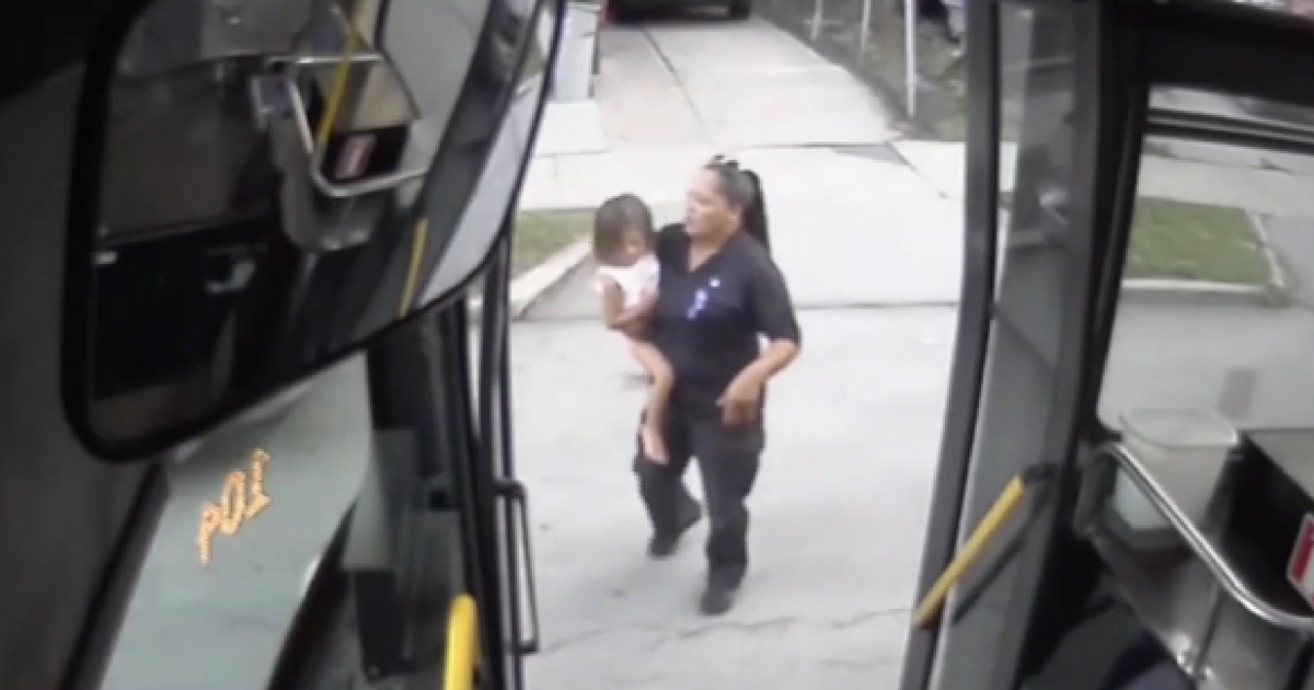 A bus driver finds a toddler walking near the road and picks her up to safety.