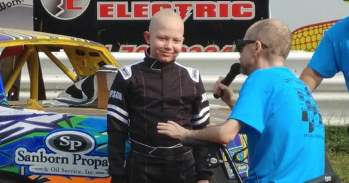 Boy with cancer has day at racetrack.