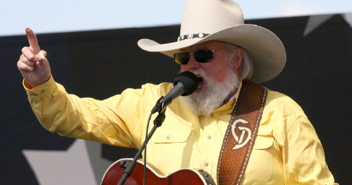 Charlie Daniels with guitar not shown.