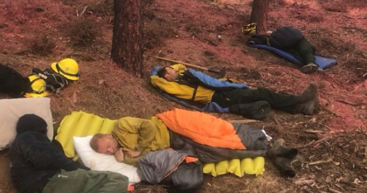 Firefighters Sleeping After Fire