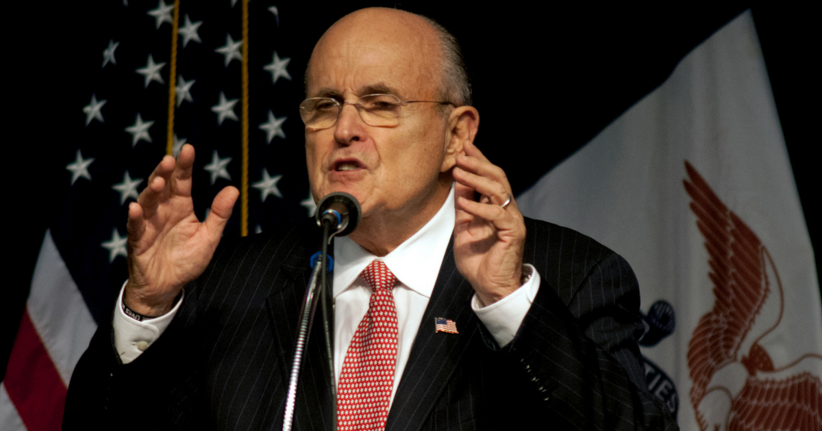 Former New York CIty Mayor Rudy Giuliani warms up the crowd of 1600 supporters at a Donald Trump campaign rally.