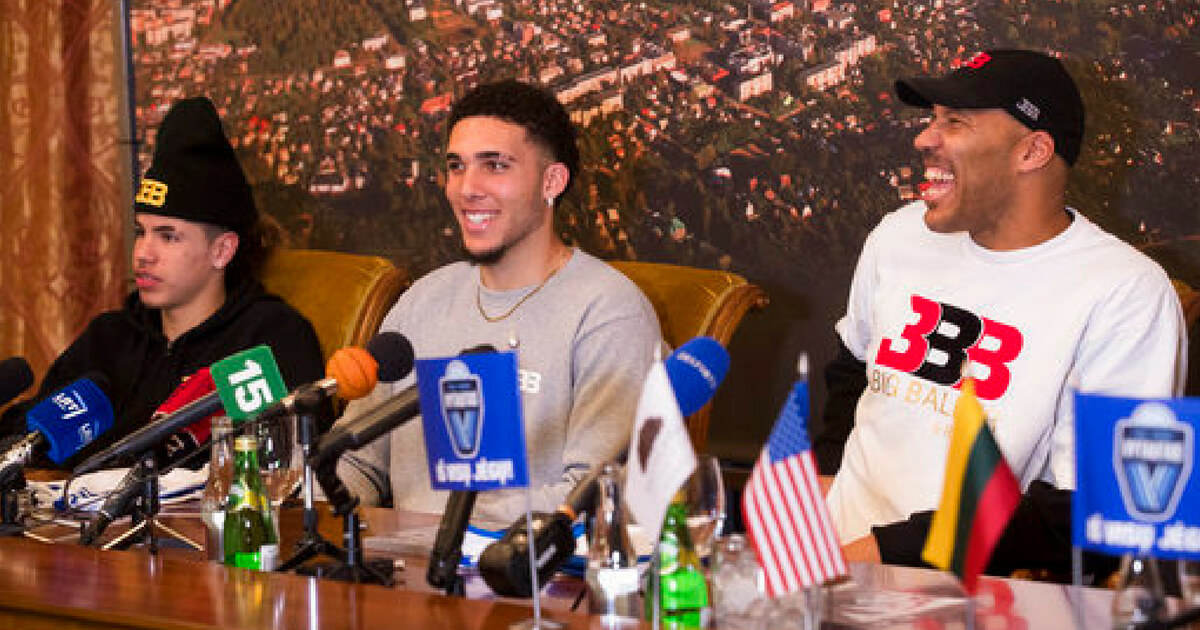LiAngelo Ball, center, and LaMelo Ball, left, and their father LaVar Ball participate in a media conference at the Harmony park hotel in Vaizgaikiemis village, Prienai district, Lithuania, Friday, Jan. 5, 2018. LiAngelo Ball and LaMelo Ball both signed a one-year contracts to play for Lithuanian professional basketball club Prienai - Birstonas Vytautas.