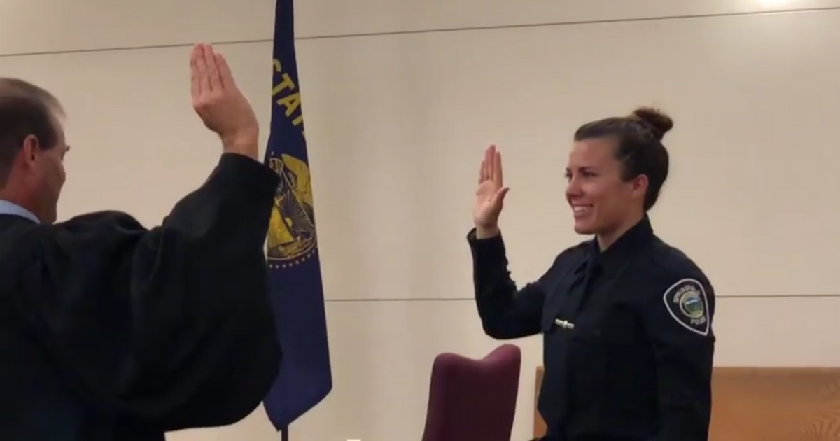 Las Vegas massacre survivor Lauren Card being sworn in as a police officer