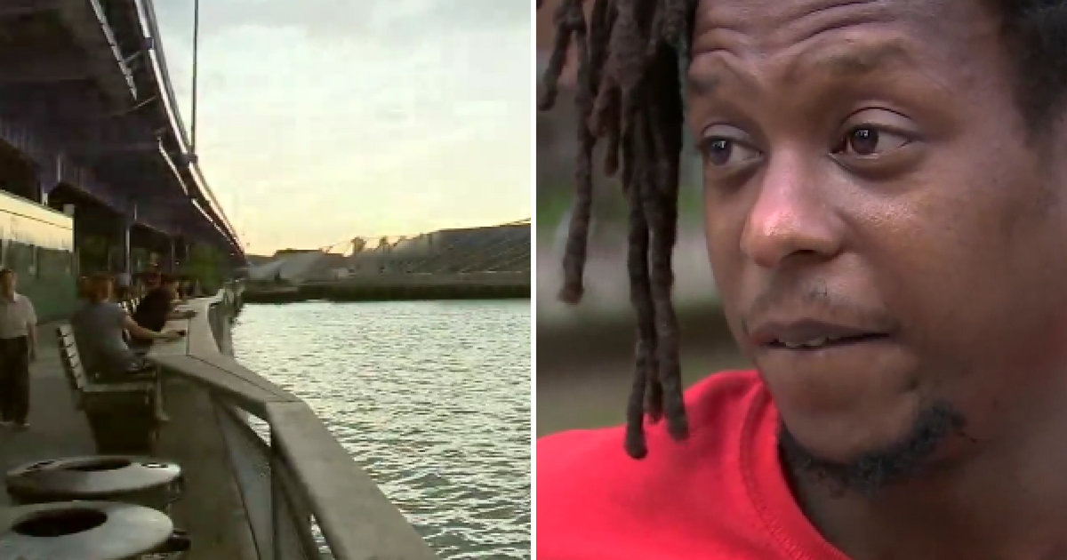 Man Jumps in Water to Save Woman