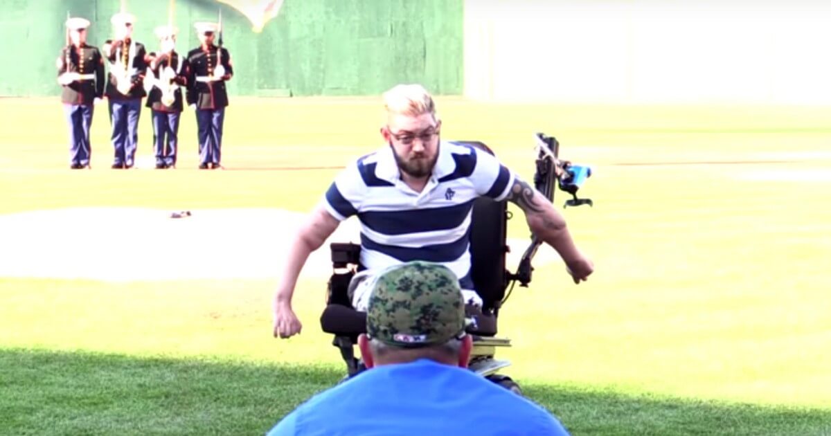 Marine veteran John Peck, who lost both of his arms and both of us legs, threw out the first pitch at a Rockland Boulders minor league baseball game.