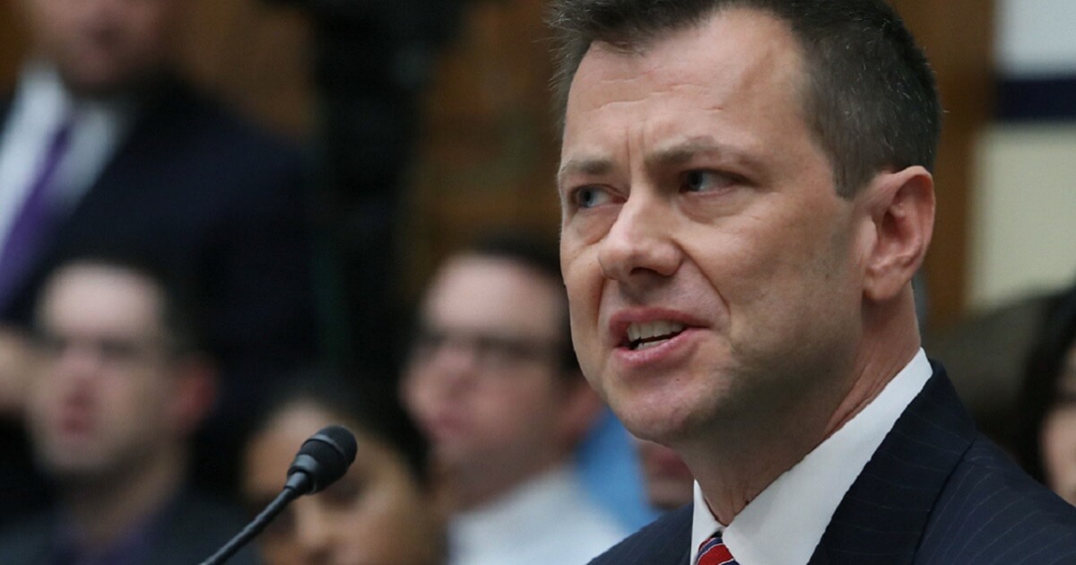 Peter Strzok seated before a microphone.