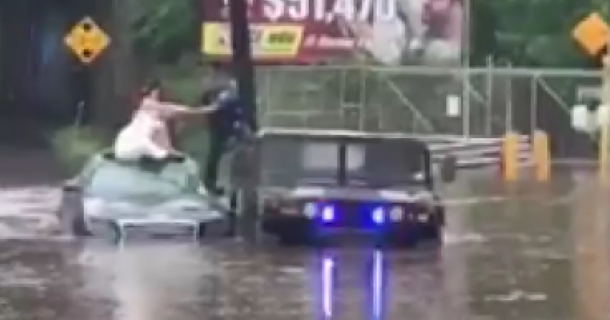 Police Save Couple from Flood on Wedding Day