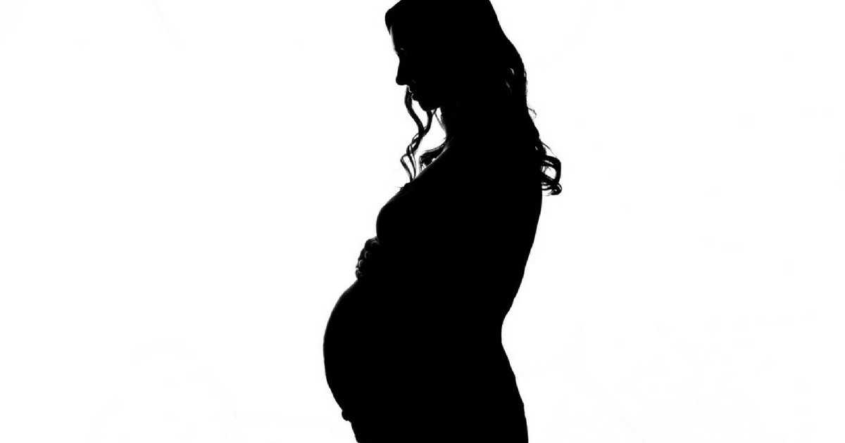 Silhouette image of a pregnant woman