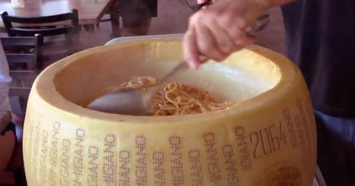 A restaurant makes spaghetti in a 200 pound cheese wheel.