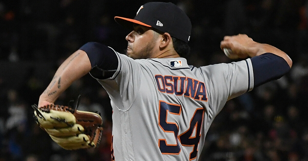 Roberto Osuna #54 of the Houston Astros pitches against the San Francisco Giants in the bottom of the eighth inning at AT&T Park on August 6, 2018 in San Francisco.