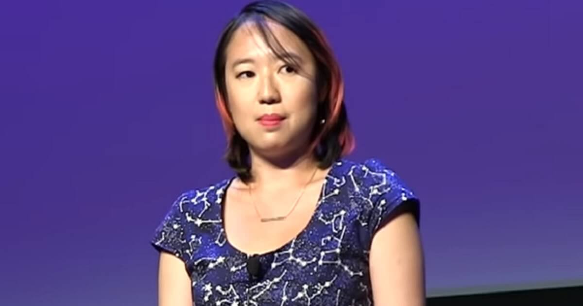 Sarah Jeong alone on a stage