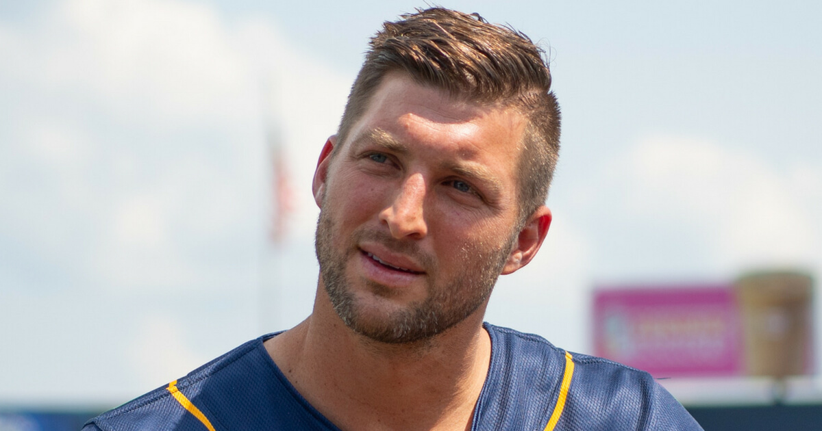 Tim Tebow of the Eastern Division All-Stars answers questions from the media before the 2018 Eastern League All Star Game at Arm & Hammer Park on July 11 in Trenton, New Jersey.