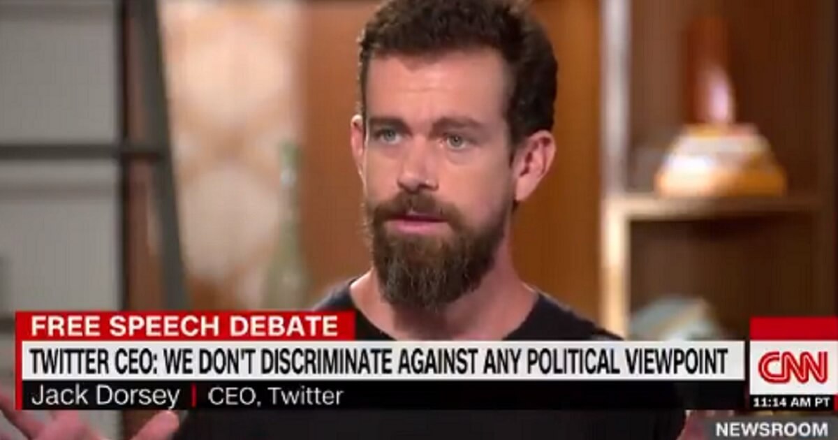 Jack Dorsey seated for a TV interview.