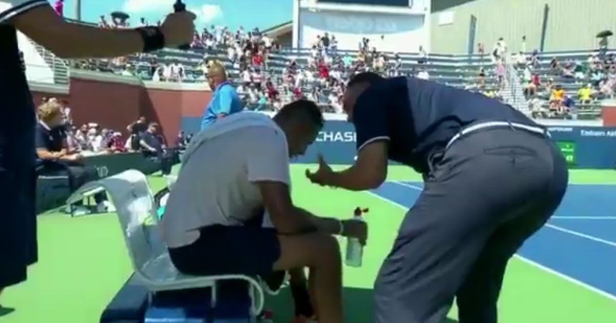 Chair umpire Mohamed Lahyani gives a pep talk to tennis star Nick Kyrgios on Thursday at the U.S. Open.
