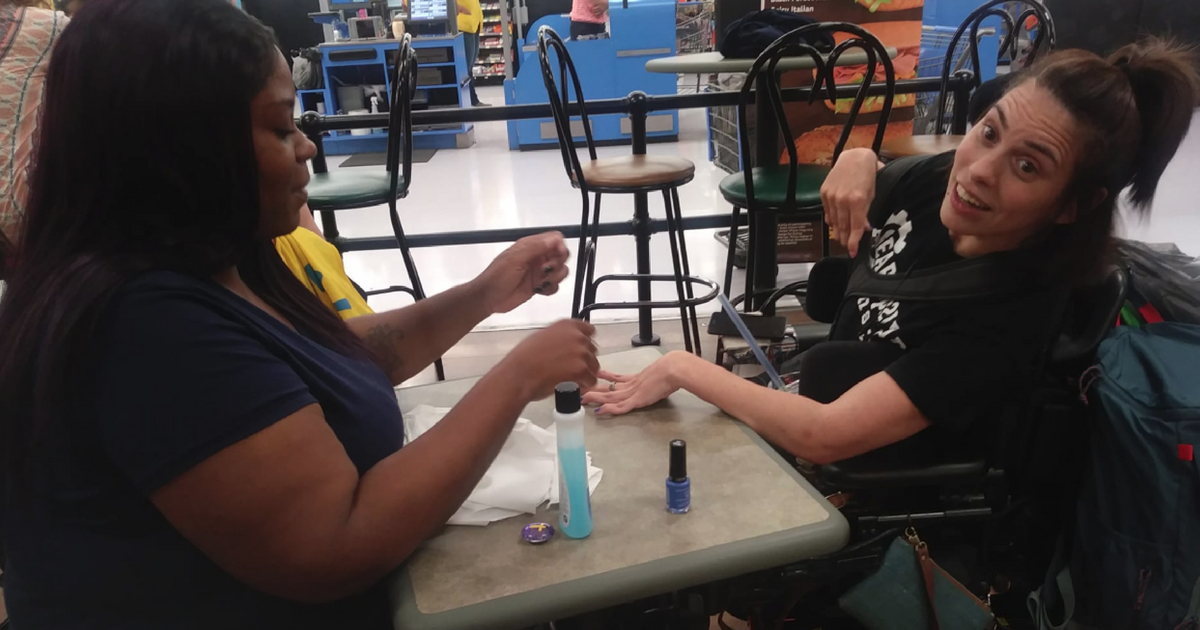 Woman Paints Nails for Girl with Cerebral Palsy