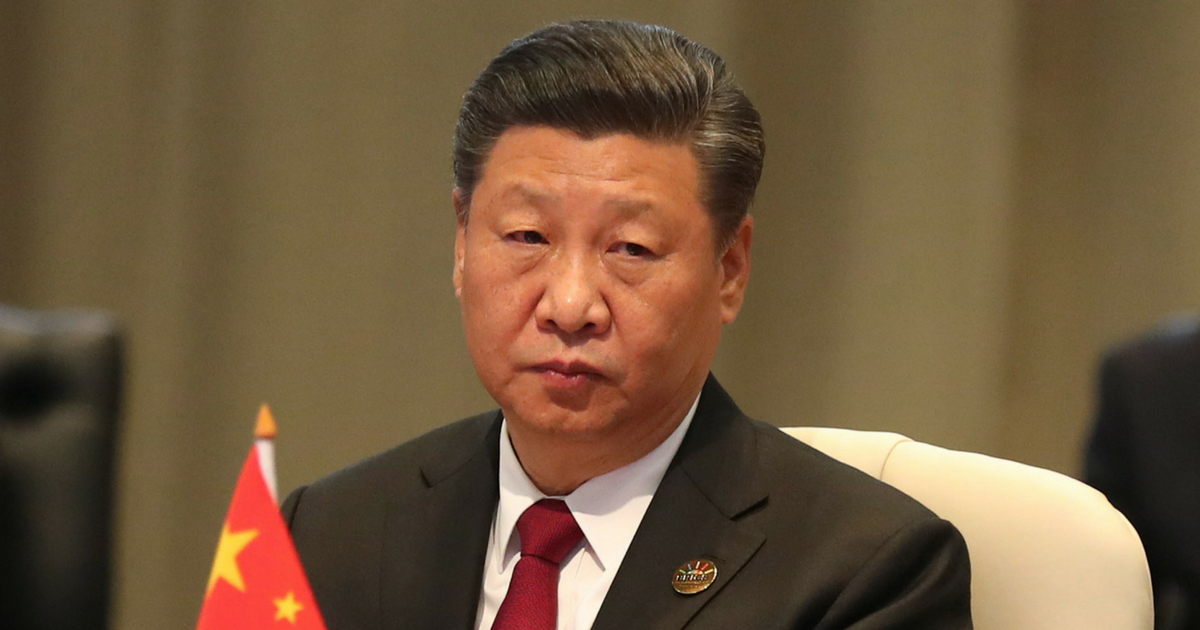 China's President Xi Jinping takes his seat at the first closed session of leaders of the 10th BRICS Summit (acronym for the grouping of the world's leading emerging economies, namely Brazil, Russia, India, China and South Africa) on July 26, 2018 at the Sandton Convention Centre in Johannesburg, South Africa.