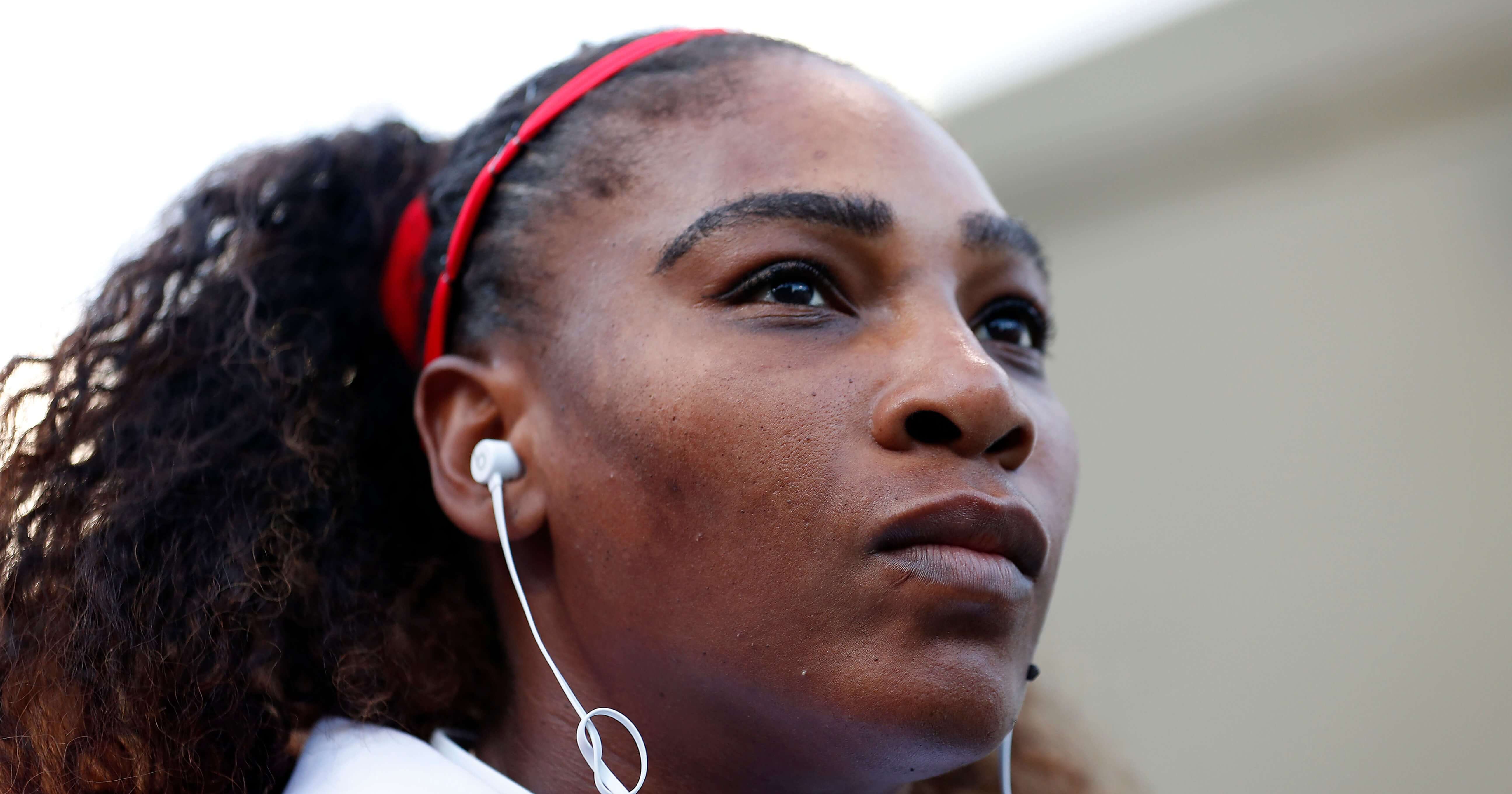 In this Tuesday, July 31, 2018, file photo, Serena Williams, of the United States, waits to walk onto the court before the match against Johanna Konta, from Britain, during the Mubadala Silicon Valley Classic tennis tournament in San Jose, Calif. Williams says she's been struggling with postpartum emotions and wants other new moms to know they are "totally normal."