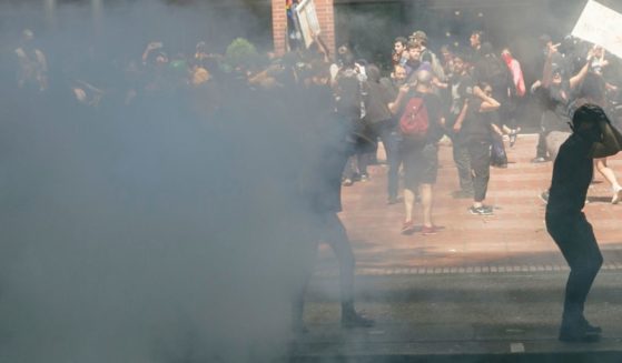 Police clash with antifa demonstrators during a rally in Portland, Oregon, on Aug. 4, 2018.