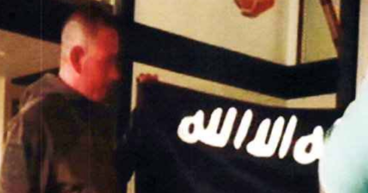 U.S. Army sergeant Ikaika Erik Kang with ISIS flag