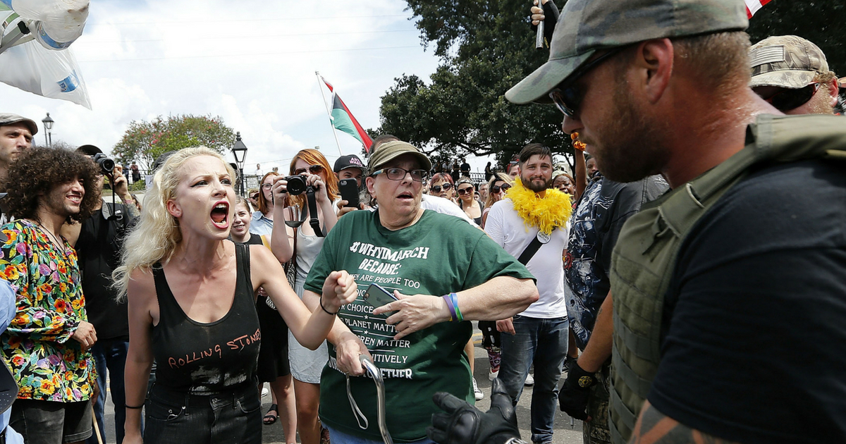 Woman yells at man at Charlottesville rally