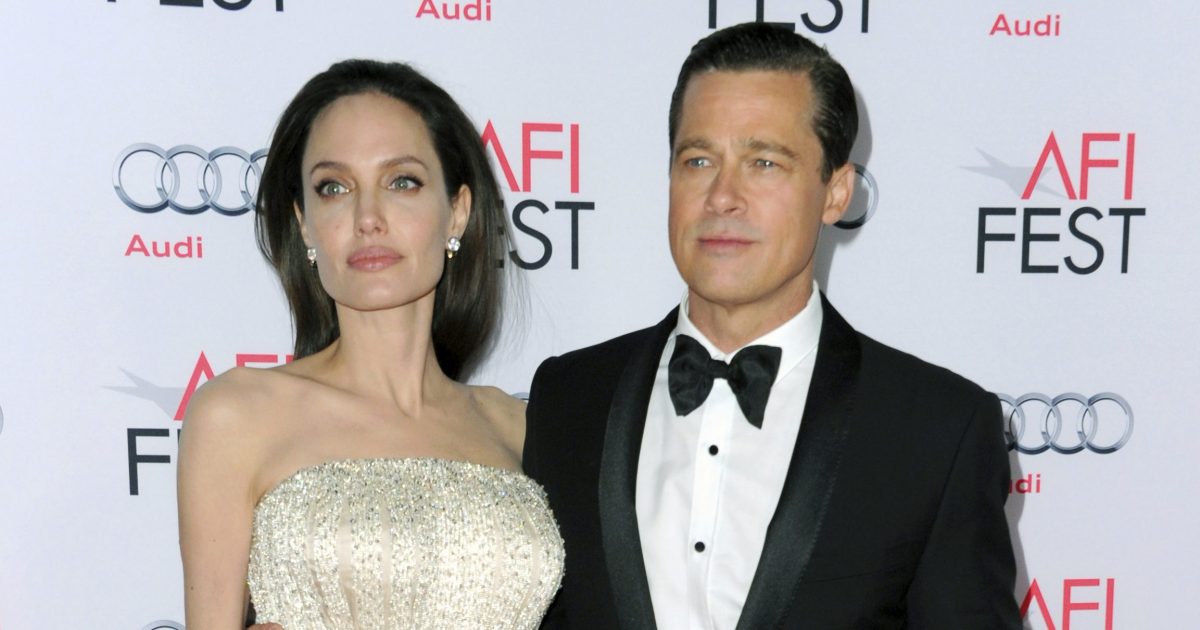 In this Nov. 5, 2015 file photo, Angelina Jolie, left, and Brad Pitt arrive at the 2015 AFI Fest opening night premiere of "By The Sea" in Los Angeles.