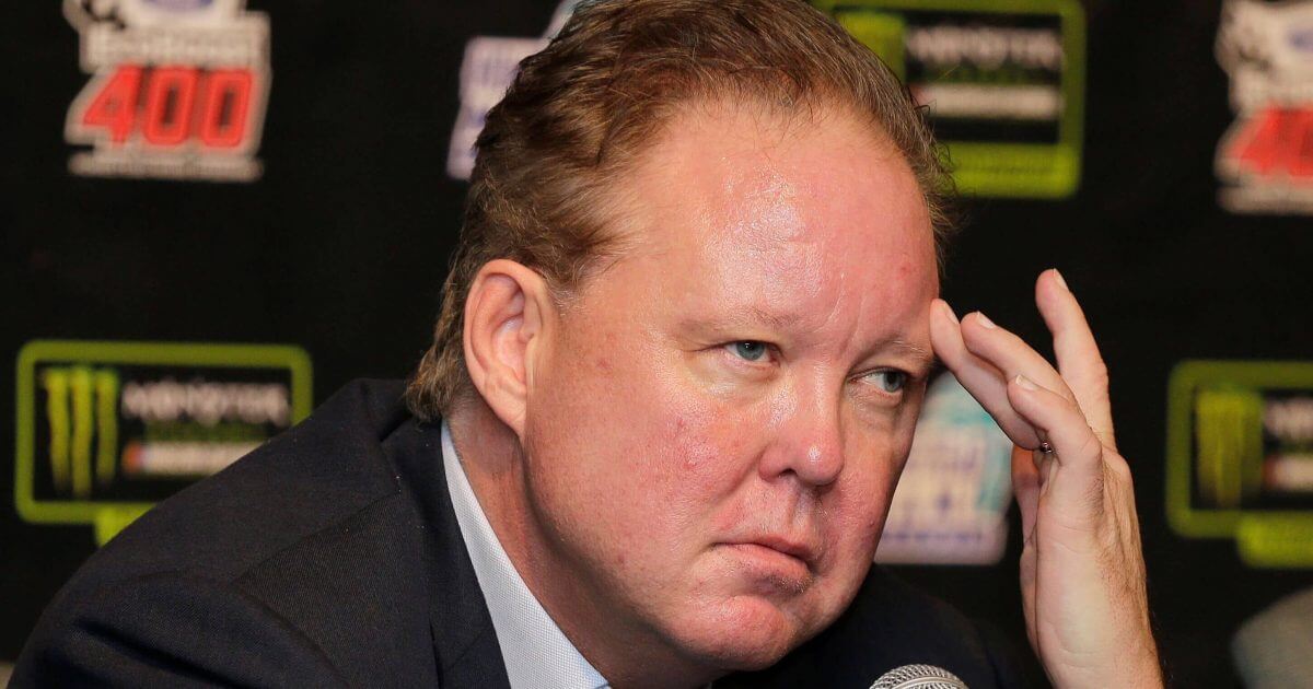 Brian France, NASCAR Chairman, ponders a question during a news conference.