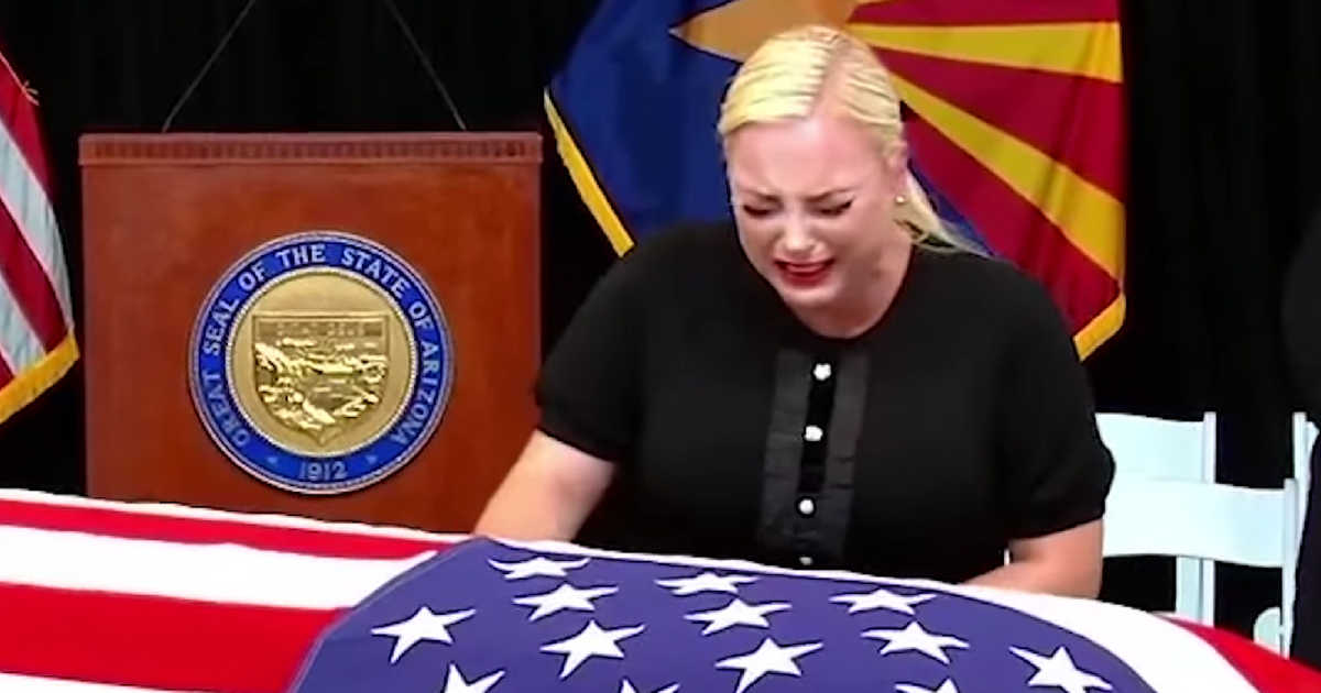 Meghan McCain cries over casket at father's funeral