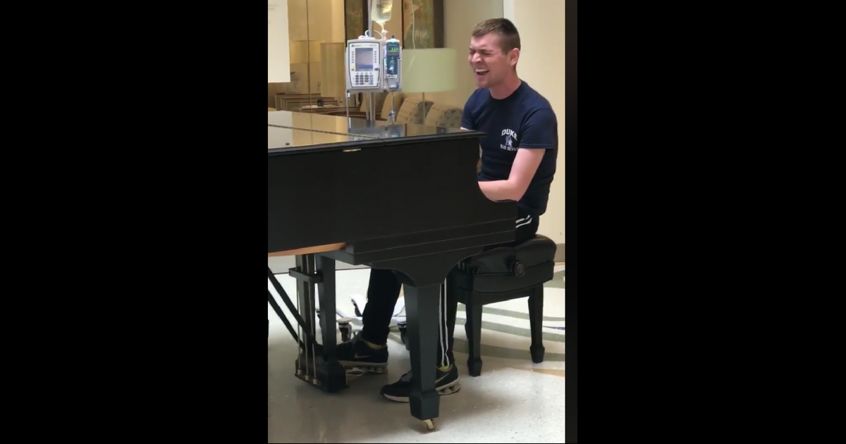 A man struggling with a disease wrote and performed an original song for hospital patients and doctors.