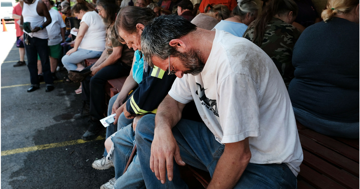 People praying in West Virginia town