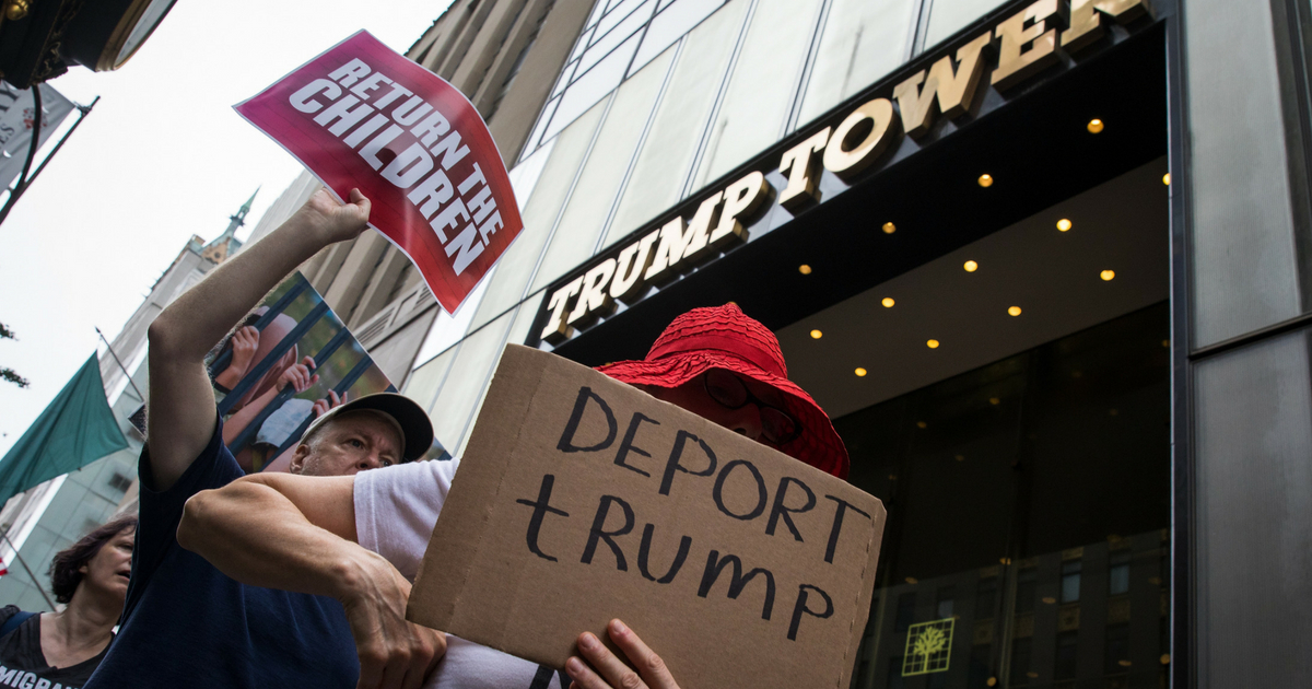 'Deport Trump' protest sign