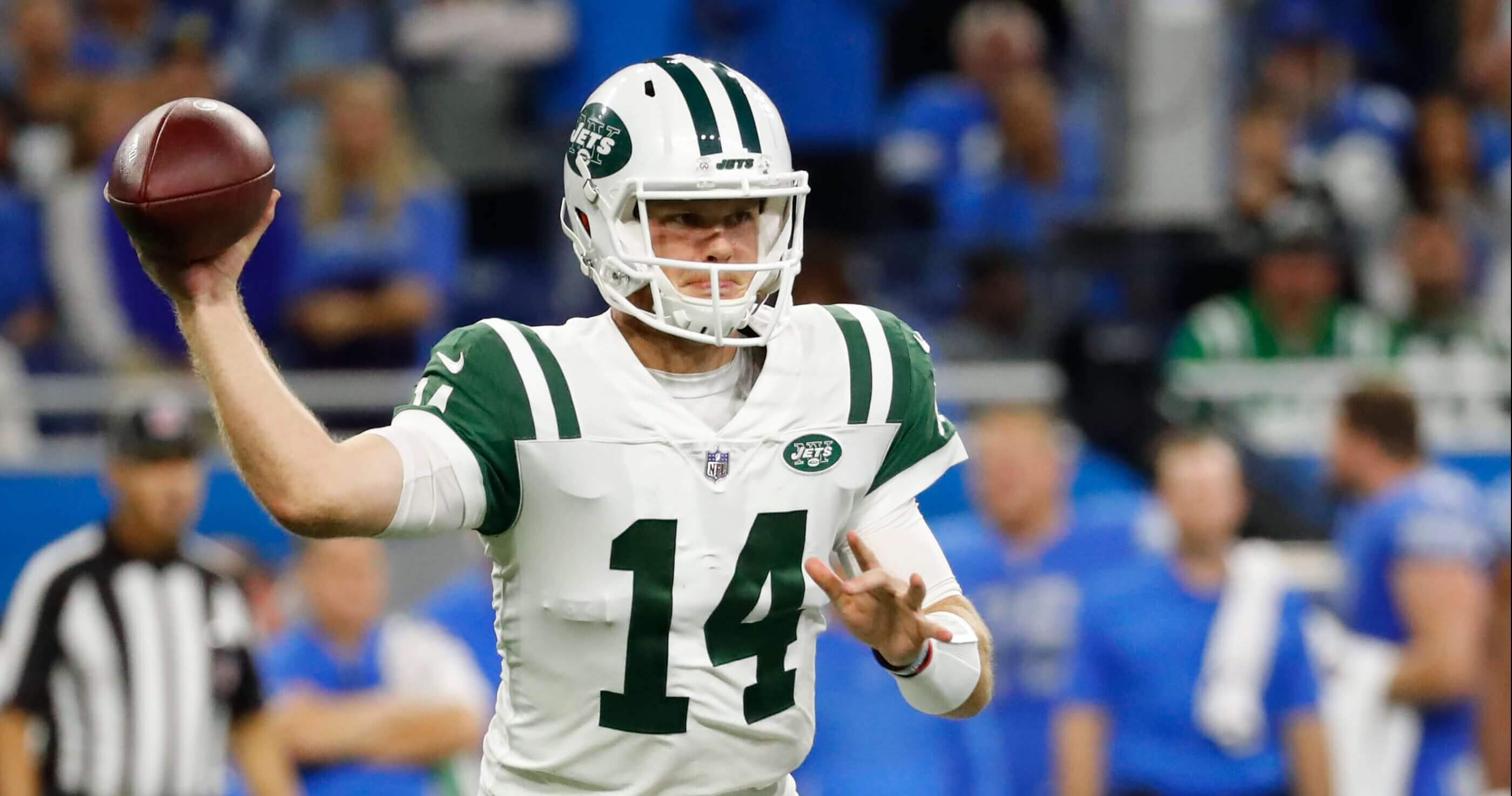 Jets rookie quarterback Sam Darnold throws a pass against the Lions in the first half of New York's season opener Monday night in Detroit.