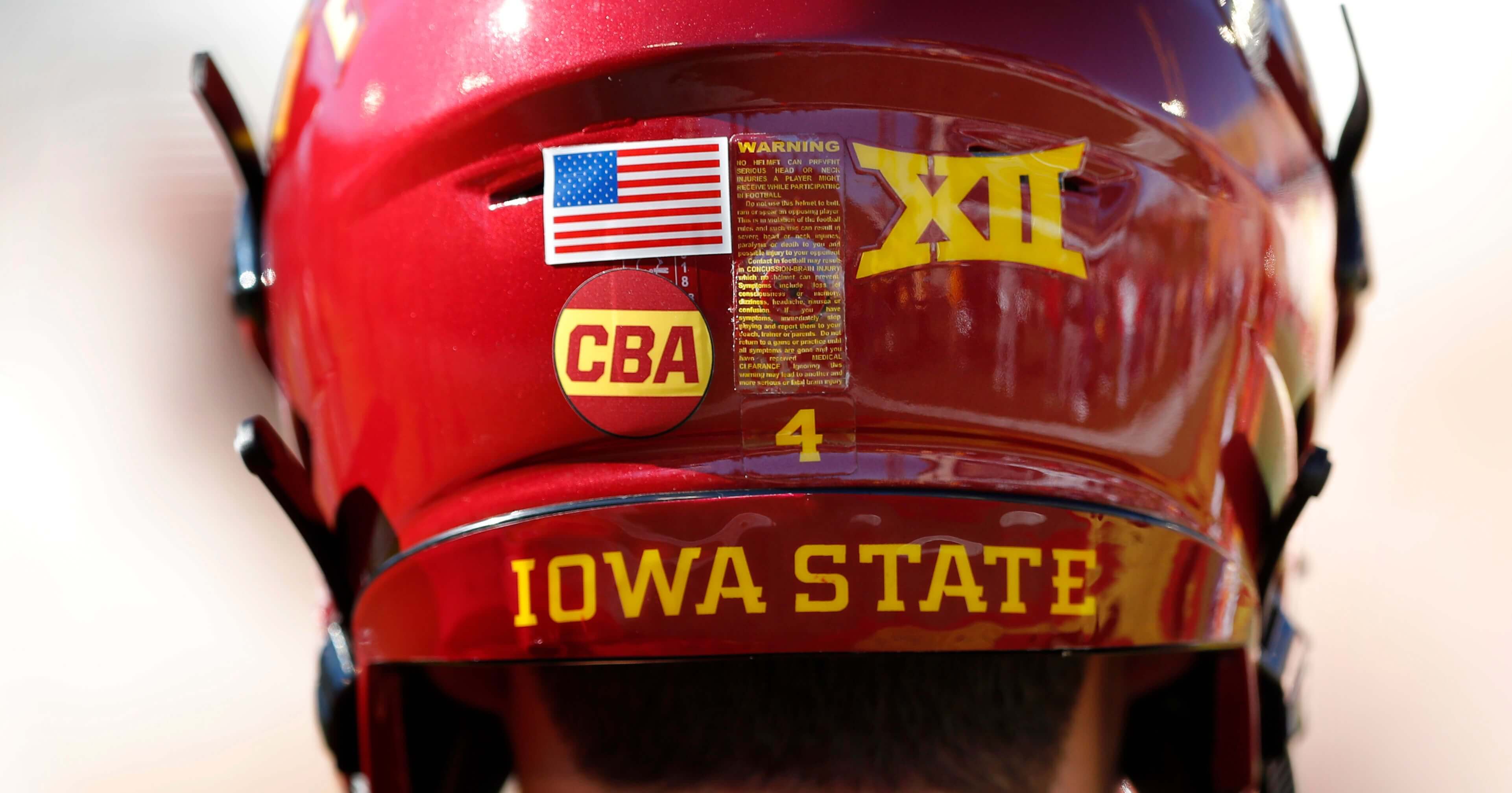 Iowa State quarterback Zeb Noland wears a "CBA" sticker on his helmet to honor slain student Celia Barquin Arozamena before a game against Akron, Saturday in Ames. Barquin, who was the 2018 Big 12 women's golf champion and Iowa State Female Athlete of the Year, was found Monday morning in a pond at a golf course near the Iowa State campus.