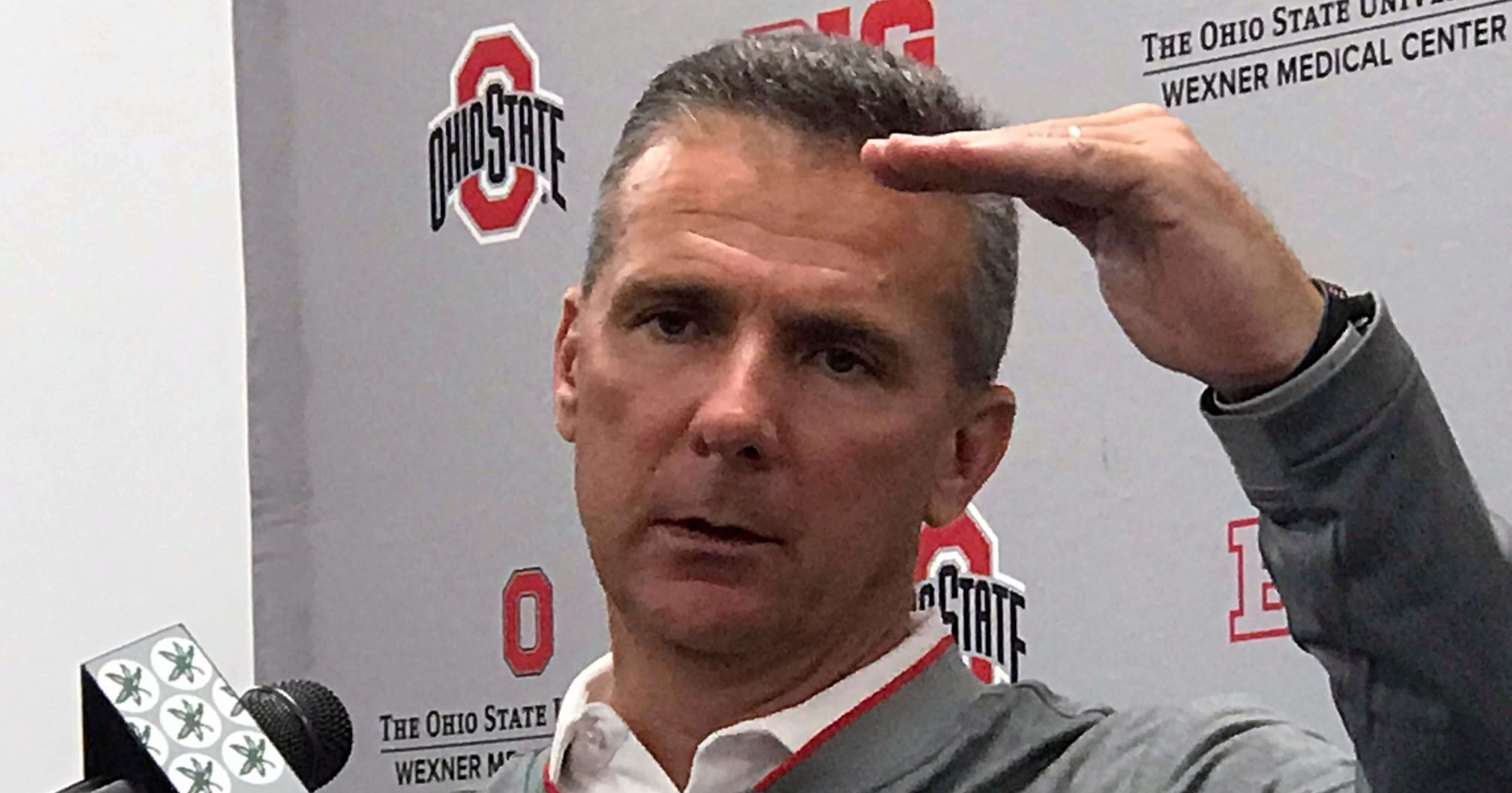 Ohio State coach Urban Meyer gestures while speaking at a news conference in Columbus, Ohio, on Monday.