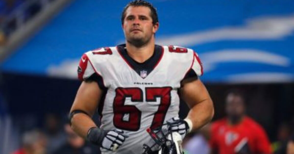 Atlanta Falcons guard Andy Levitre walks onto the field before a game at Carolina in 2017.