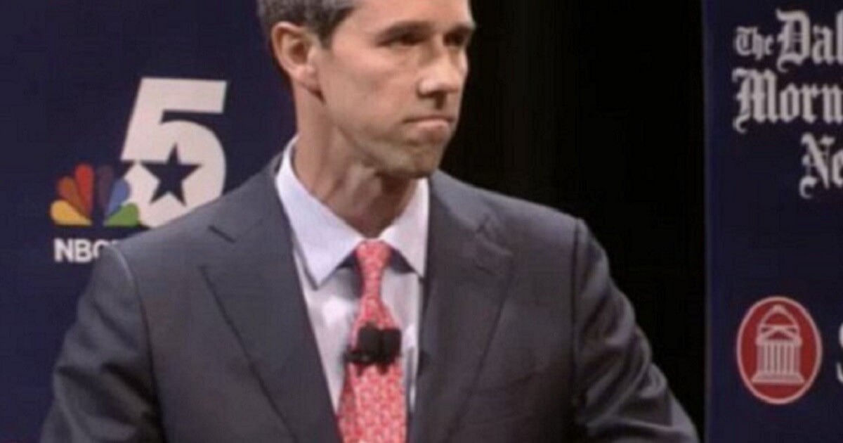 "Bet" O'Rourke stands at a lecturn.