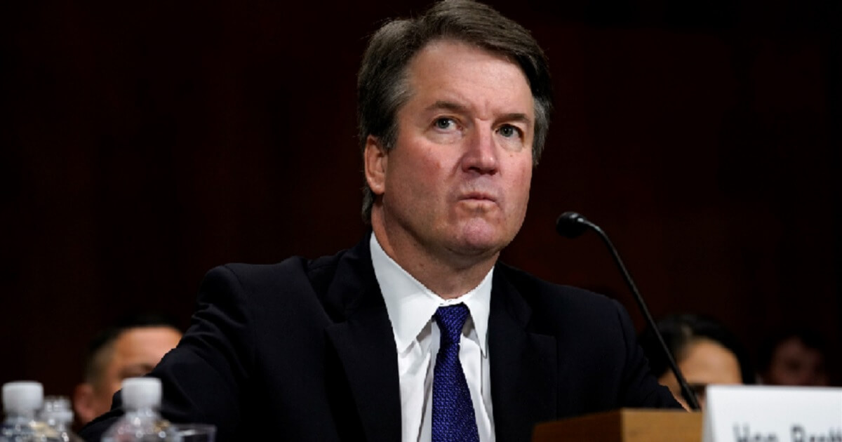 Supreme Court nominee Brett Kavanaugh scowls Thursday while testifying before the Senate Judiciary Committee.