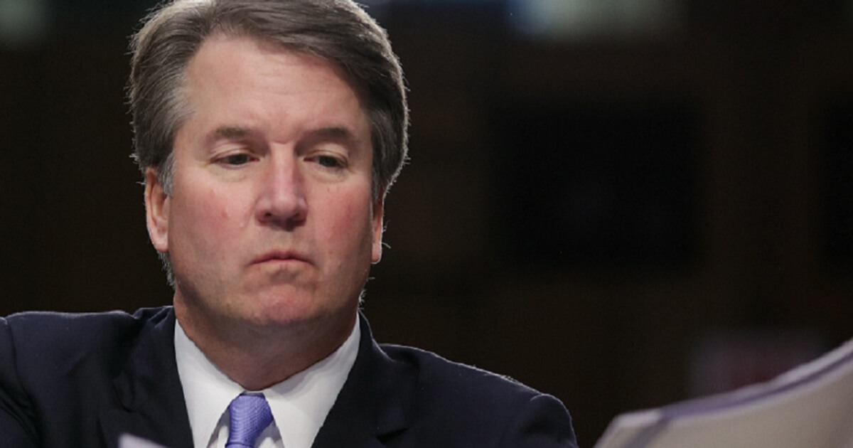 Supreme Court nominee Brett Kavanaugh looks over notes as he testifies before the Senate Judiciary Committee on Sept. 6.