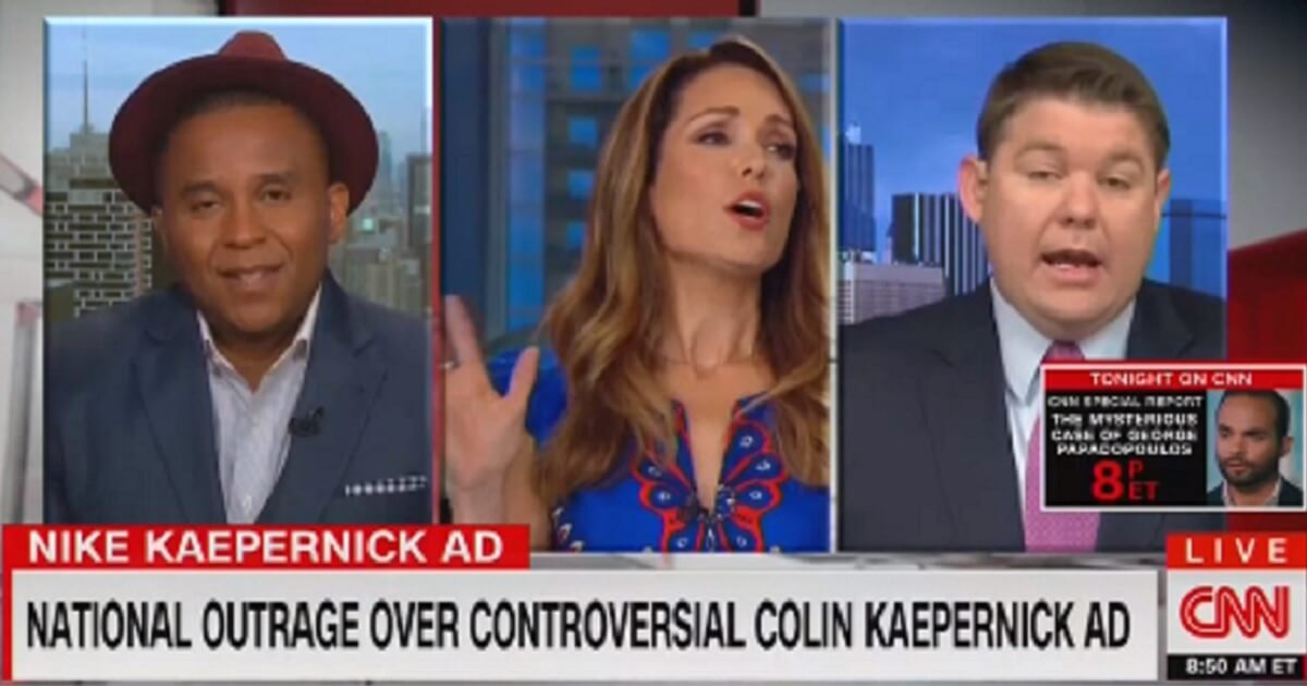 CNN "New Day Saturday" anchor Christi Paul reacts as conservative Ben Ferguson makes his point about the NFL's national anthem protests.
