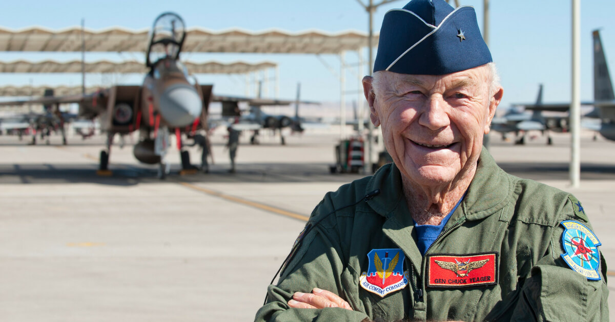 Gen. Chuck Yeager poses for photographers.