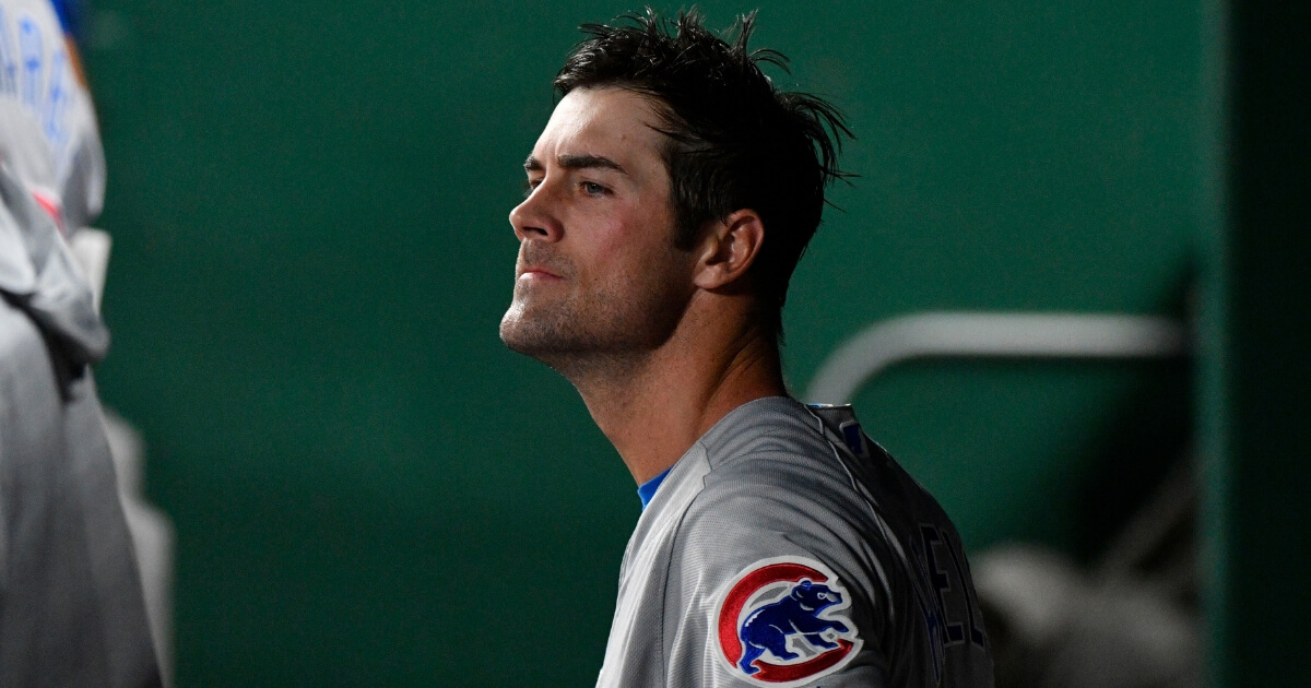 Cole Hamels of the Chicago Cubs watches from the dugout during an Aug. 6 game against the Royals at Kauffman Stadium in Kansas City.