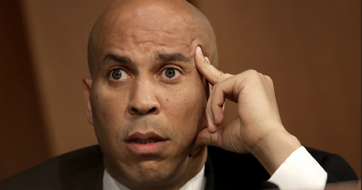New Jersey Democrat Sen. Cory Booker speaks Tuesday during Supreme Court nominee Brett Kavanaugh's first day of hearings before the Senate Judiciary Committee.