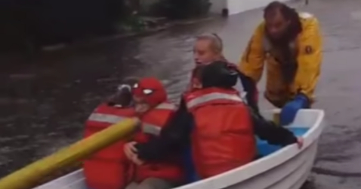 First responders in Stamford, Connecticut rescue children whose school bus stalled on a flooded street.