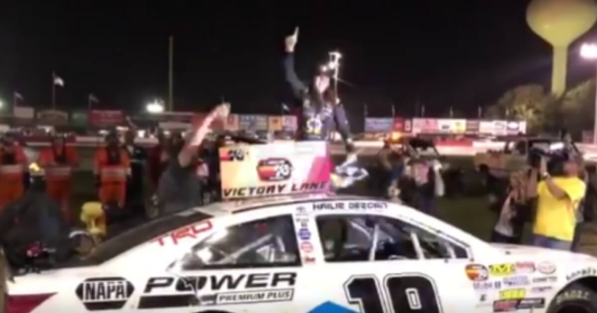 Hailie Deegan celebrates on Saturday after she became the first female to ever win a race in a NASCAR series.