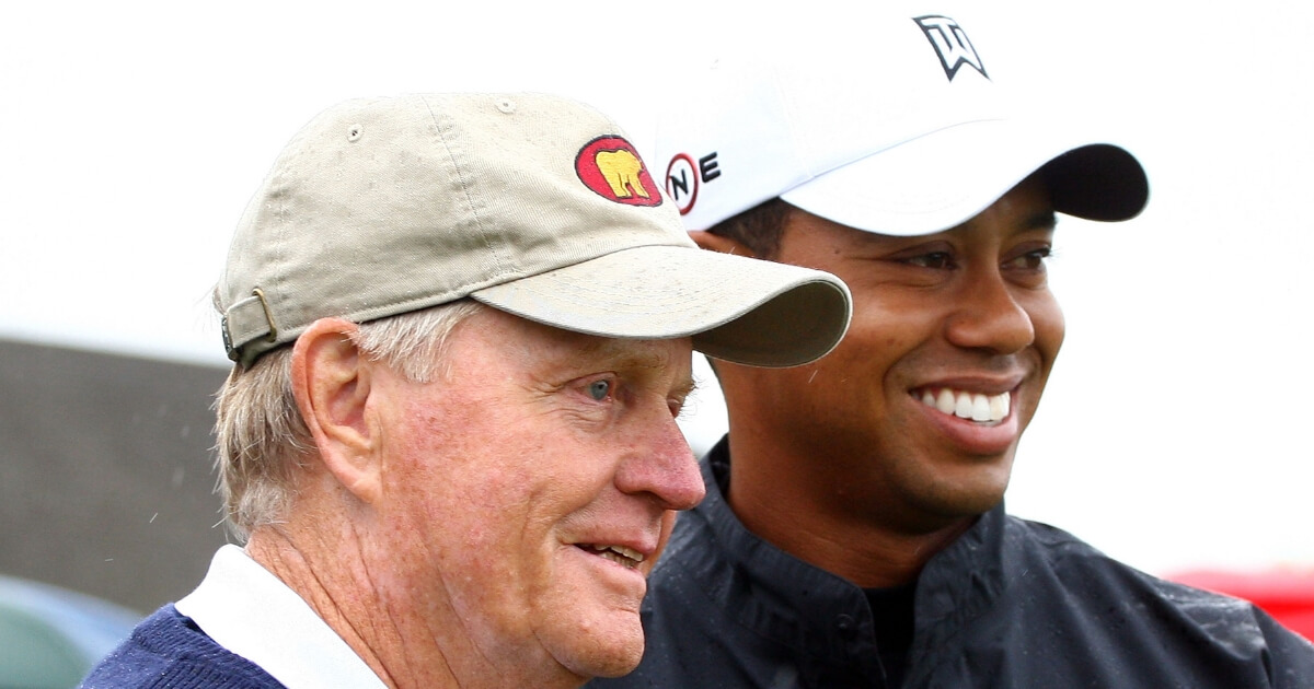 Jack Nicklaus, left, and Tiger Woods pose before the first round of the 2009 Memorial Tournament in Dublin, Ohio.