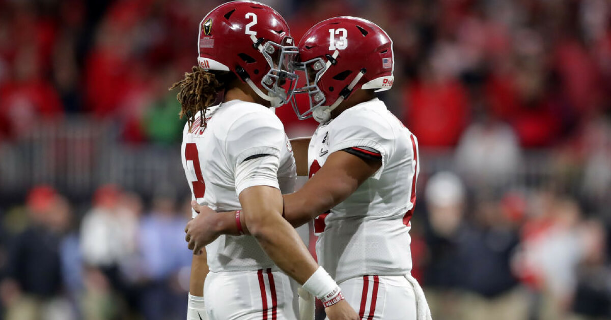 University of Alabama quarterbacks Jalen Hurts, left, and Tua Tagovailoa, right, during the 2018 College Football Playoff Championship