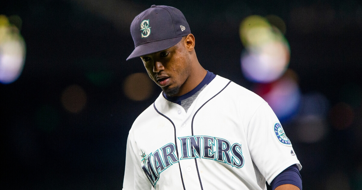 Jean Segura of the Seattle Mariners walks off the field after the top of the seventh inning, in which Baltimore Orioles scored four runs at Safeco Field in Seattle on Tuesday.